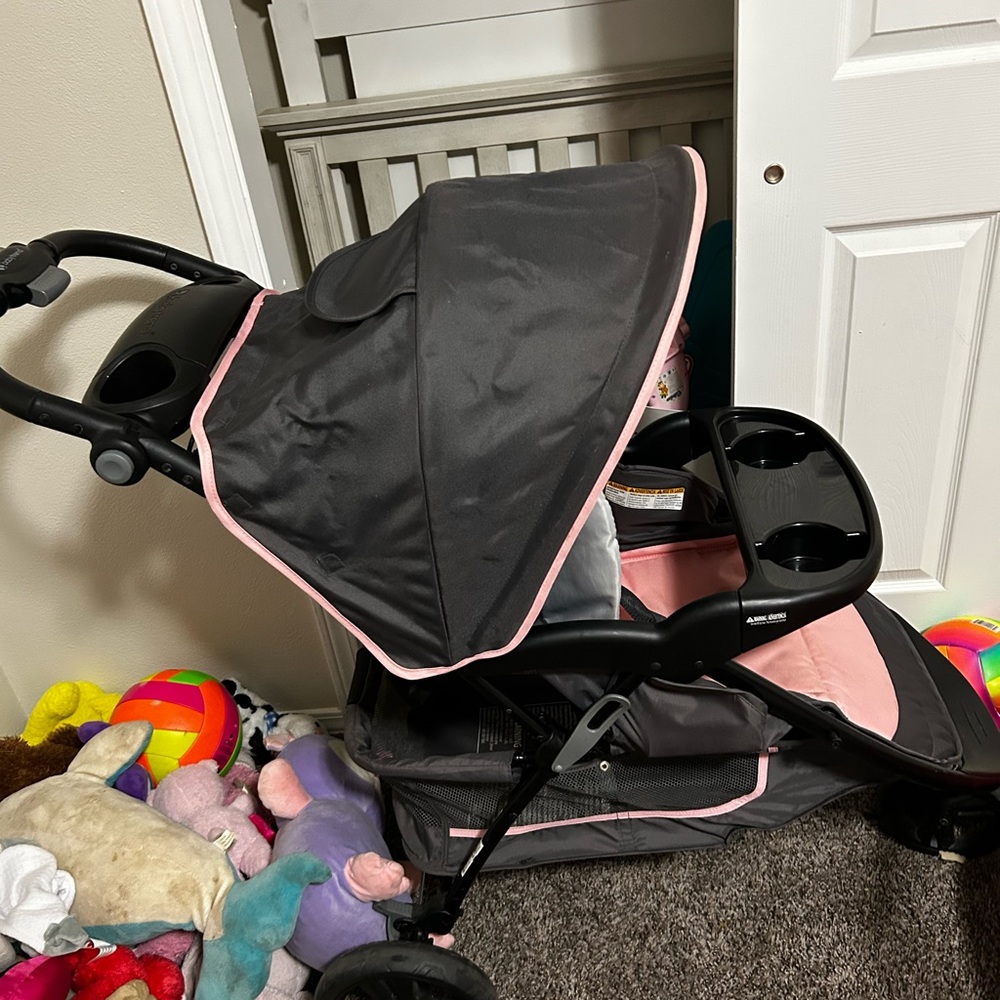 Gray and Pink Stroller